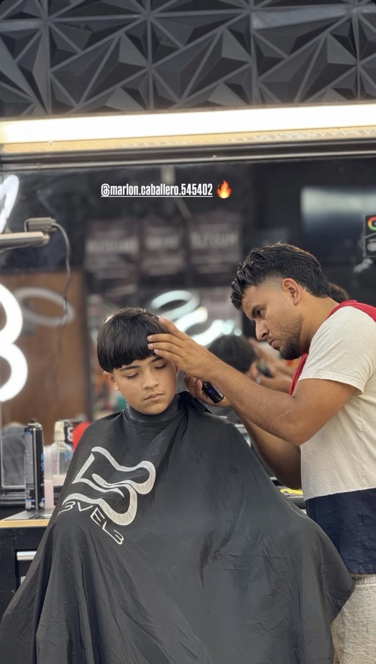 Marlon, barber at Muma's